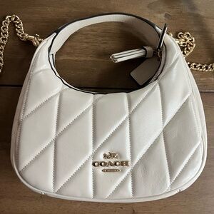 Coach cream crescent crossbody bag